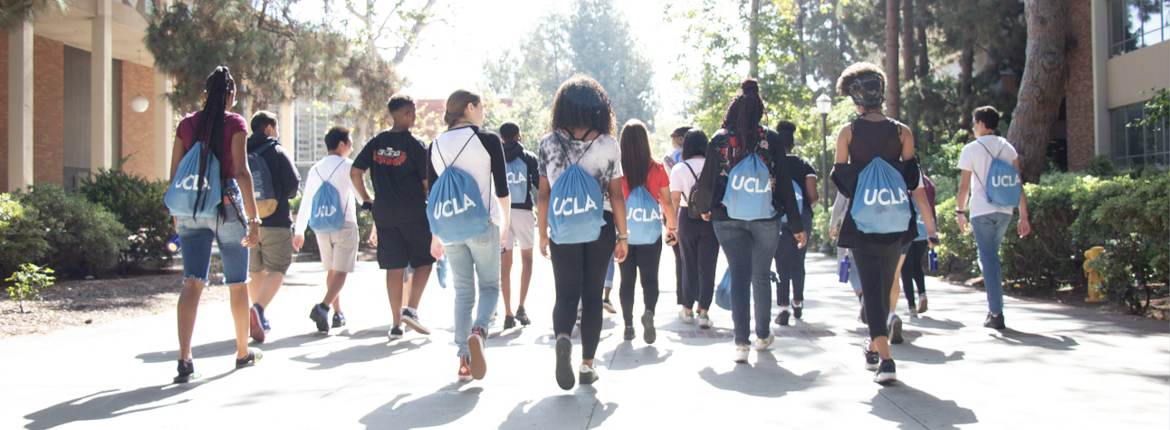 Students on campus wearing UCLA cinch bags